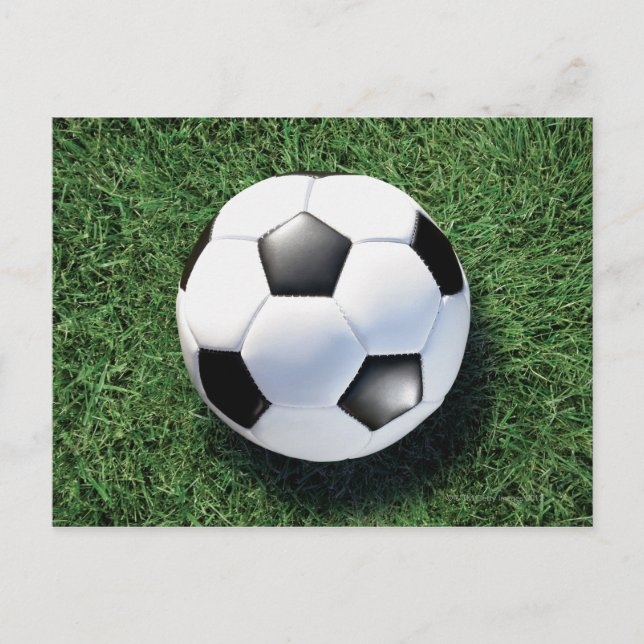Soccer ball on green grass, close-up postcard (Front)