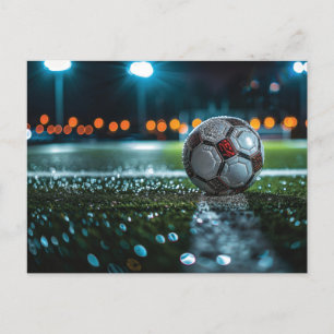 Soccer ball on the empty wet arena pitch holiday postcard