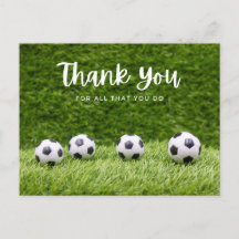 Soccer ball thank you with ball on green grass 