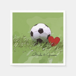 Soccer ball with red heart on green wedding napkin