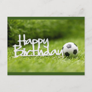Soccer Birthday card with ball on green grass 