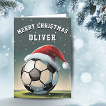 Soccer Football Ball Santa Hat Merry Christmas  Holiday Card<br><div class="desc">Soccer Football Ball Santa Hat Name Merry Christmas Card. The design has a soccer ball with a red Santa hat. Personalise with your name. You can change the text Merry Christmas.</div>