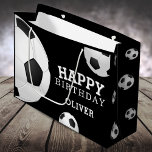 Soccer Football Ball Sports Happy Birthday Name Large Gift Bag<br><div class="desc">Soccer Football Ball Sports Happy Birthday Name Gift Bag. Soccer,  football balls with a Happy birthday wish on black background. Personalise with your name and make a special personal gift bag for a boy or a girl who loves soccer,  football.</div>