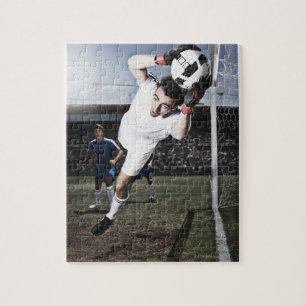 Soccer goalie catching soccer ball jigsaw puzzle