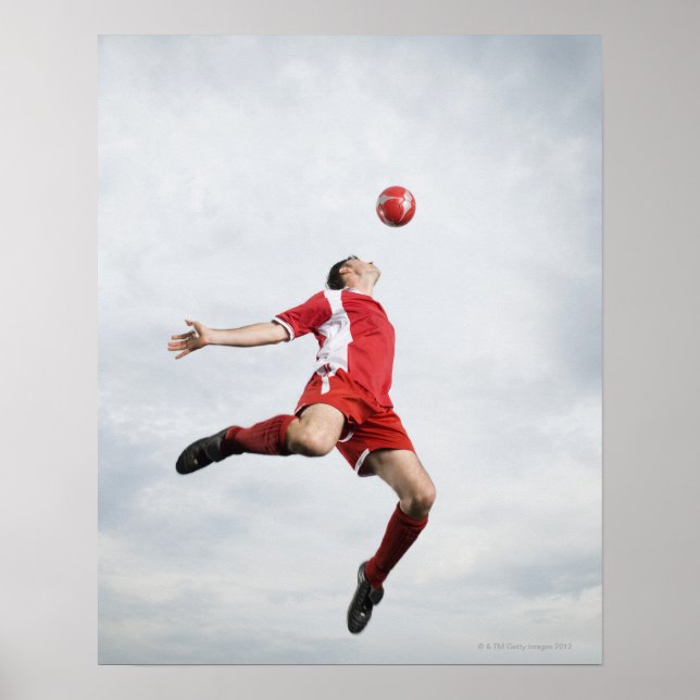 Soccer player and soccer ball in mid-air poster (Front)
