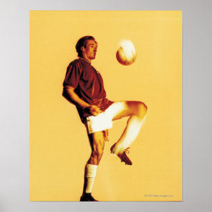 soccer player bouncing ball off knee poster