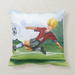Soccer Player Kicking a Ball by Jay Throckmorton Cushion
