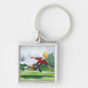 Soccer Player Kicking a Ball by Jay Throckmorton Key Ring