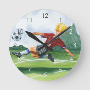Soccer Player Kicking a Ball by Jay Throckmorton Round Clock