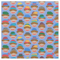 Sock Monkey Heads with caps on Blue Fabric