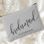 Soft Grey Bridesmaid Modern Calligraphy Accessory Pouch<br><div class="desc">Celebrate your bridal party with this elegant soft grey bridesmaid accessory pouch. Featuring modern calligraphy and customisable with your bridesmaid's name, this pouch is both stylish and practical. The soft dusty sage colour and elegant script create a sophisticated look, perfect for holding makeup, toiletries, or other essentials. This personalised pouch...</div>