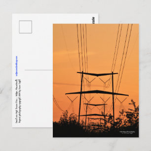 Soft orange sunset over high tension power lines postcard