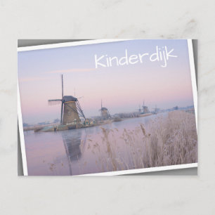 Soft sunrise light in winter over windmills postcard