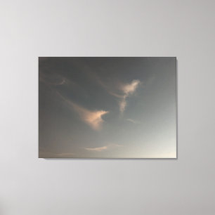 Soft wispy clouds at sunset in Cornwall  Canvas Print