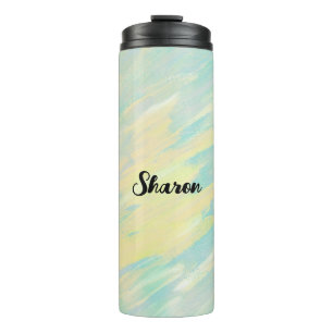 Soft yellow and aquamarine thermal tumbler