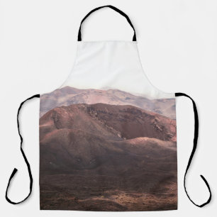 SOIL MOUNTAINS DURING DAY APRON