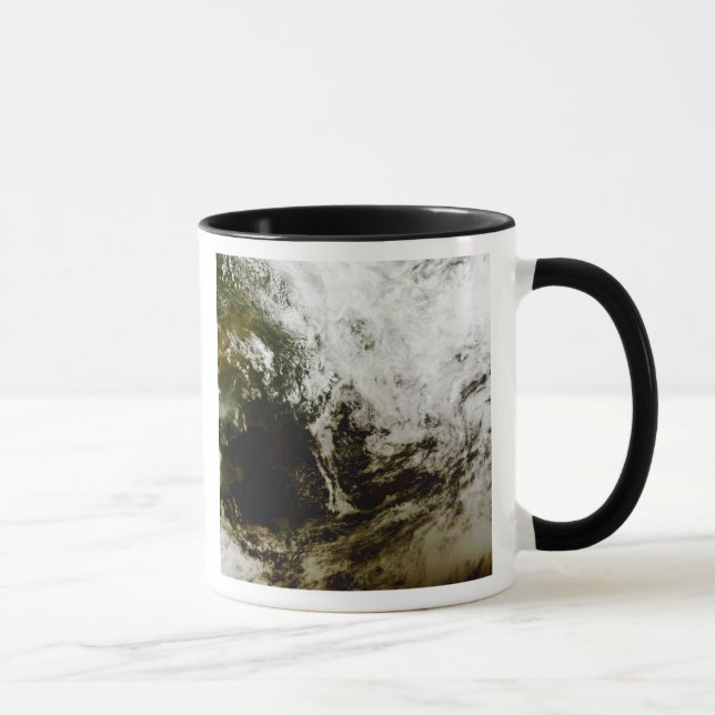 Solar eclipse over southeast Asia Mug (Right)