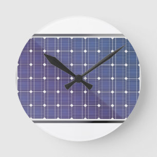 Solar panel on white round clock
