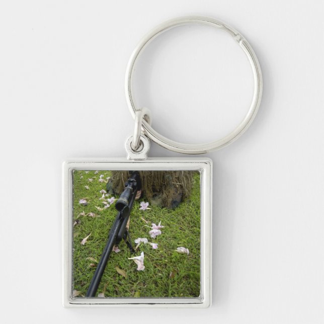 Soldier practices sniper tactics key ring (Front)