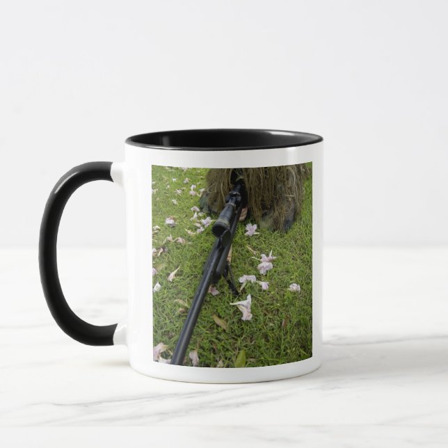Soldier practices sniper tactics mug (Left)