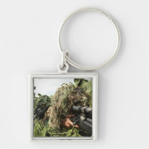 Soldiers dressed in ghillie suits key ring