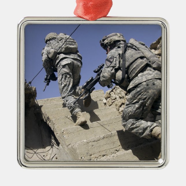 Soldiers running up staircase of a building metal tree decoration (Front)