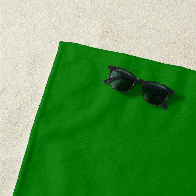 Solid bright green beach towel (In Situ)