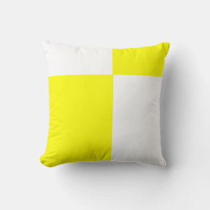 solid bright yellow and white pillow
