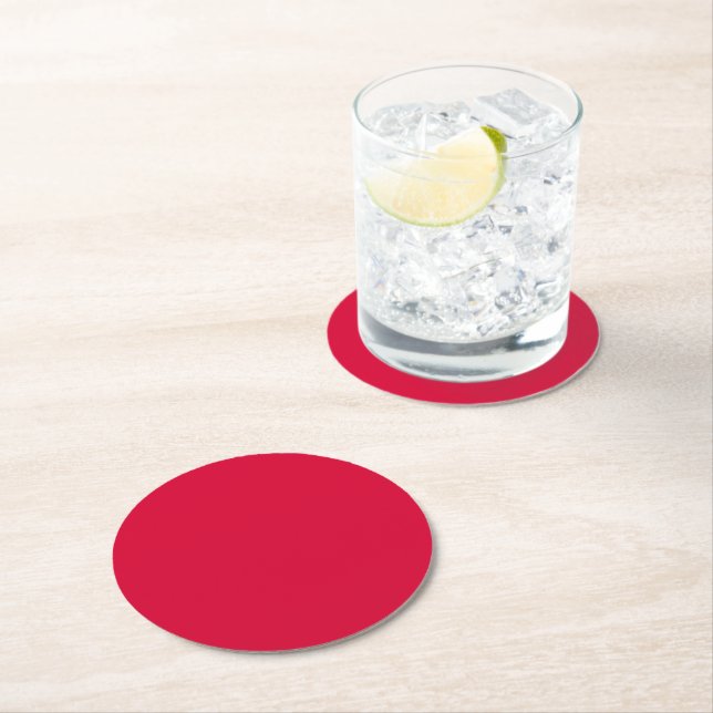 Solid crimson glory red round paper coaster (Insitu)