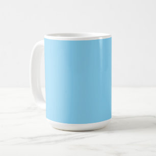 Solid light blue background evenly coloured coffee mug