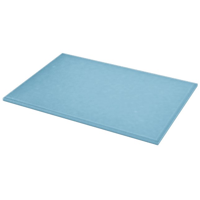Solid light blue background evenly coloured cutting board (Corner)