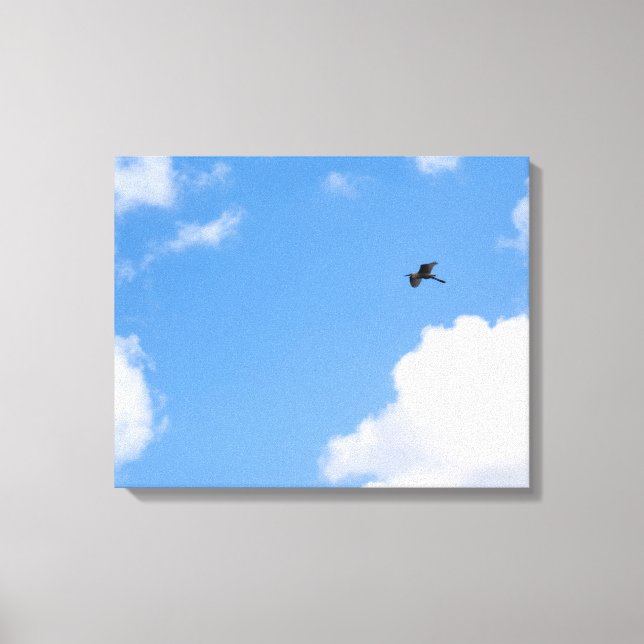 Solitary Bird Soaring Through Bright Blue Sky with Canvas Print (Front)
