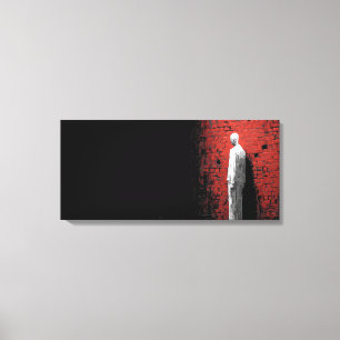 Solitary Figure Against Red Brick Wall Canvas Print