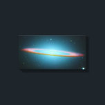 Sombrero Galaxy - M104 - wrapped canvas<br><div class="desc">This floating ring is the size of a galaxy. In fact, it is part of the photogenic Sombrero Galaxy, one of the largest galaxies in the nearby Virgo Cluster of Galaxies. The dark band of dust that obscures the mid-section of the Sombrero Galaxy in optical light actually glows brightly in...</div>