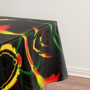 Some grass leaves, fire colours in 'flower petals' tablecloth