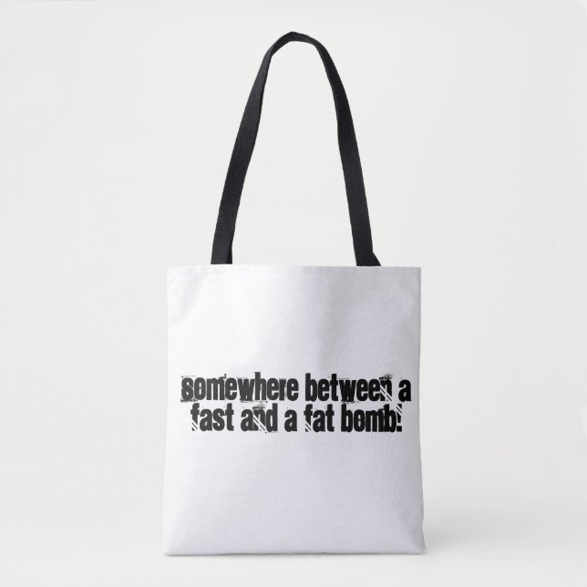Somewhere between a fast and a fat bomb tote bag (Front)
