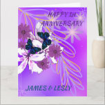 Son 1st Wedding Anniversary Purple Flowers Card<br><div class="desc">Celebrate the first milestone of love and commitment with my enchanting anniversary card! Against a serene purple background, delicate purple lilies flowers and graceful blue butterflies dance in harmony, evoking the beauty and joy of marriage. This customisable card allows you to add your own text, creating a heartfelt message for...</div>