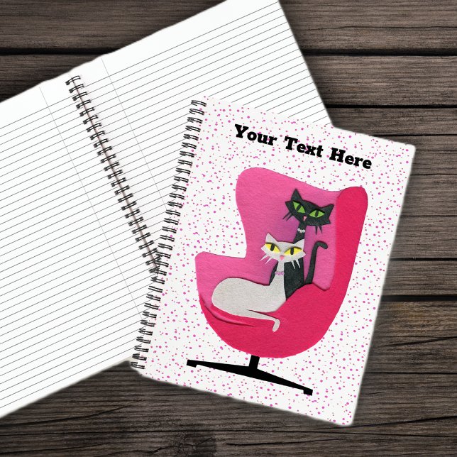 Sophisticated Atomic Cats Diamond Collars in Chair Notebook (Mid century black white cats sitting in pink chair on white with pink polka dotted spiral notebook.)