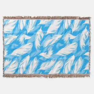 Sophisticated Feather Design On A Bright Blue Throw Blanket