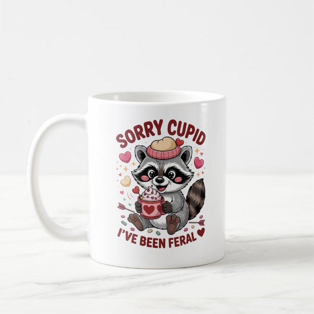 "Sorry Cupid, I've Been Feral" — Cute Raccoon  Coffee Mug (Left)