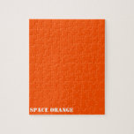 Space orange jigsaw puzzle<br><div class="desc">Show your colours with pride!  Ever dreamed of becoming an astronaut? Then this should make you feel in touch with your dream for this shade of international orange is the colour of astronaut suits.</div>