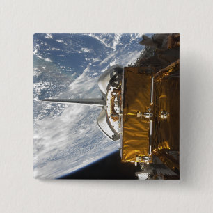 Space Shuttle Atlantis' payload bay backdropped 15 Cm Square Badge
