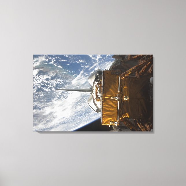 Space Shuttle Atlantis' payload bay backdropped Canvas Print (Front)