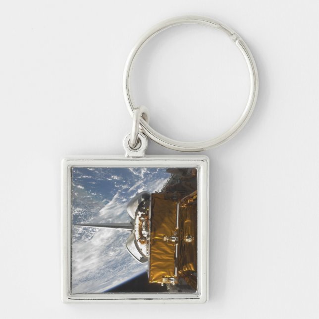Space Shuttle Atlantis' payload bay backdropped Key Ring (Front)