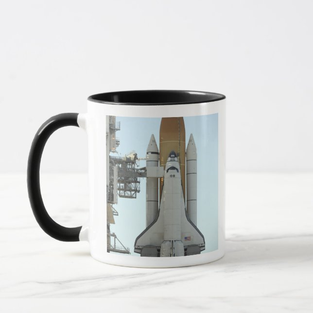 Space shuttle Atlantis sits on the launch pad Mug (Left)