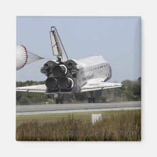 Space shuttle Atlantis unfurls its drag chute 2 Magnet