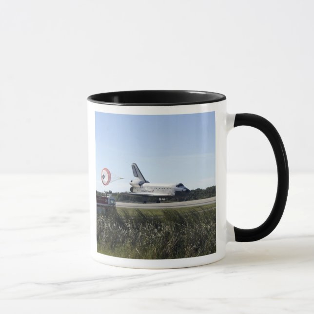 Space shuttle Atlantis unfurls its drag chute Mug (Right)