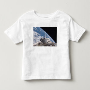 Space Shuttle Discovery backdropped by Earth Toddler T-Shirt