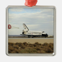 Space Shuttle Discovery deploys its drag chute