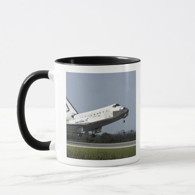 Space shuttle Discovery lands on Runway 33 2 Mug (Left)